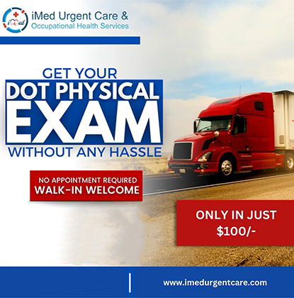 A young commercial driver behind the wheel smiles at the camera as a sign of approval.