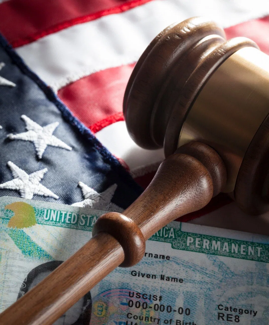 A young commercial driver behind the wheel smiles at the camera as a sign of approval.