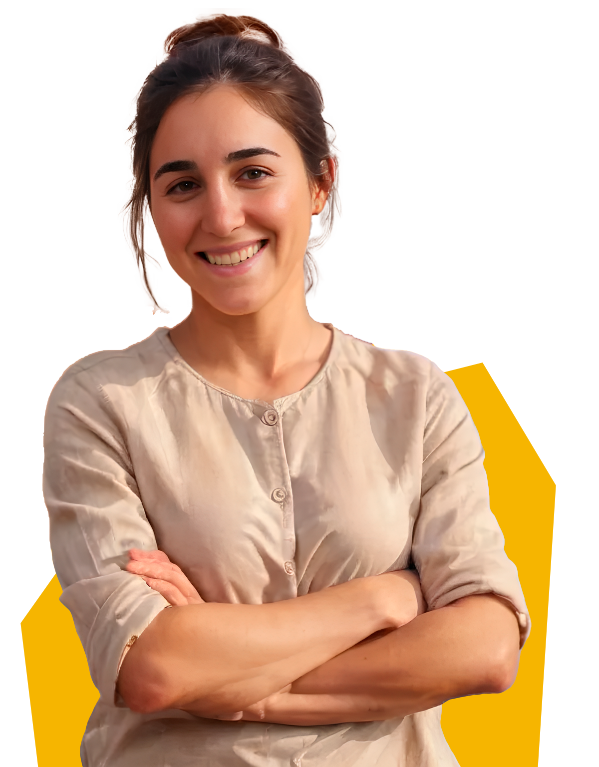 Fotografía de María, profesora de español de IB, sonriente y con los brazos cruzados.