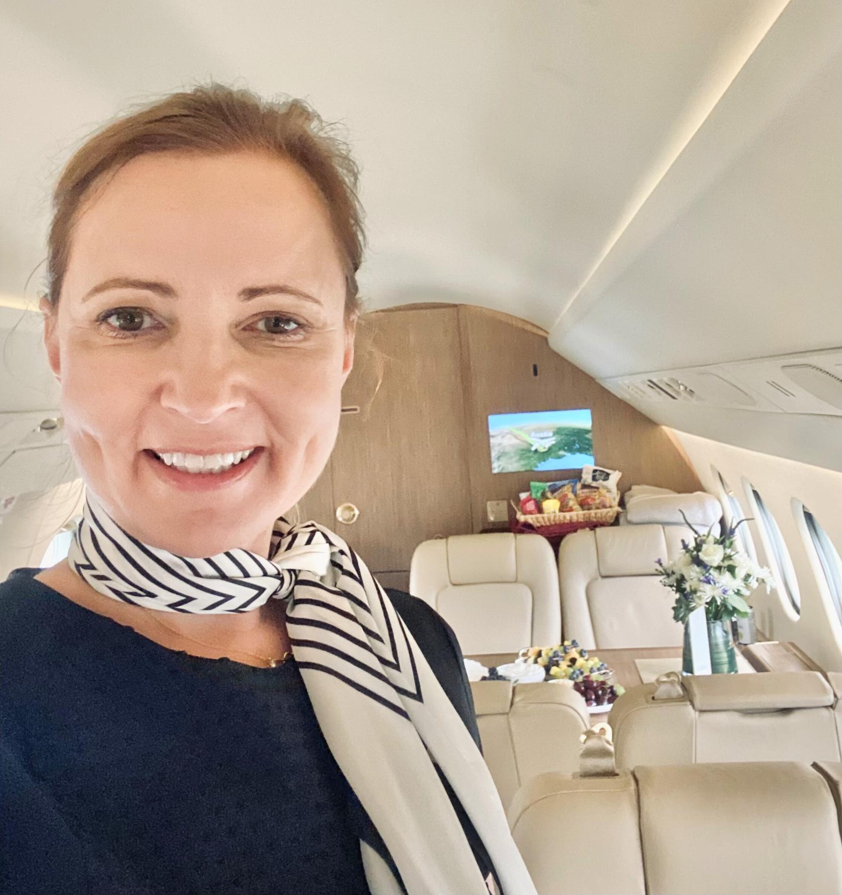 Close-up of soft pink peonies in full bloom.