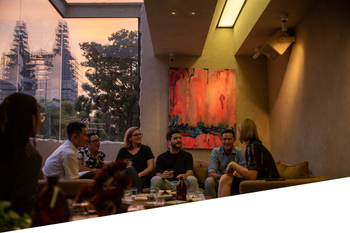 A group chatting in Saigon during the Cocktail Experience