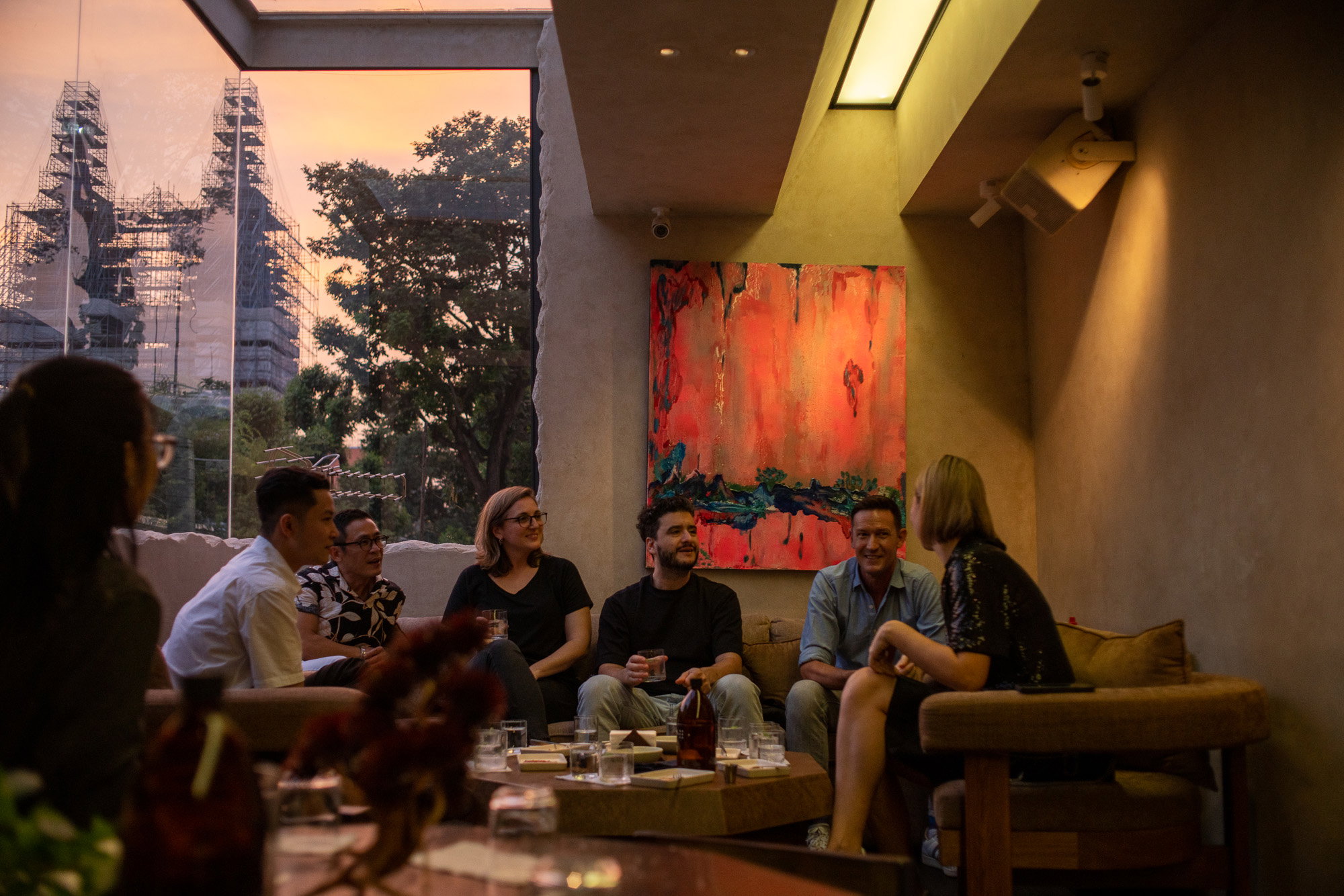 A group chatting in Saigon during the Cocktail Experience