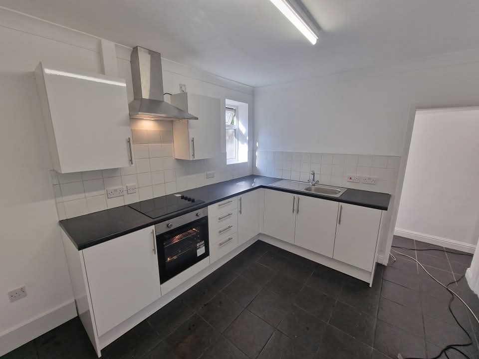 A budget friendly kitchen that's stylish for the tenants but within the landlords price range