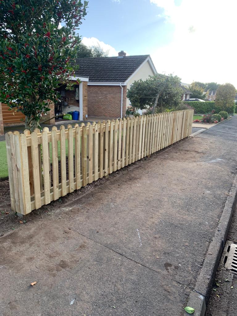 A double sided picket fence erected to look just as smart from the inside as it does the outside