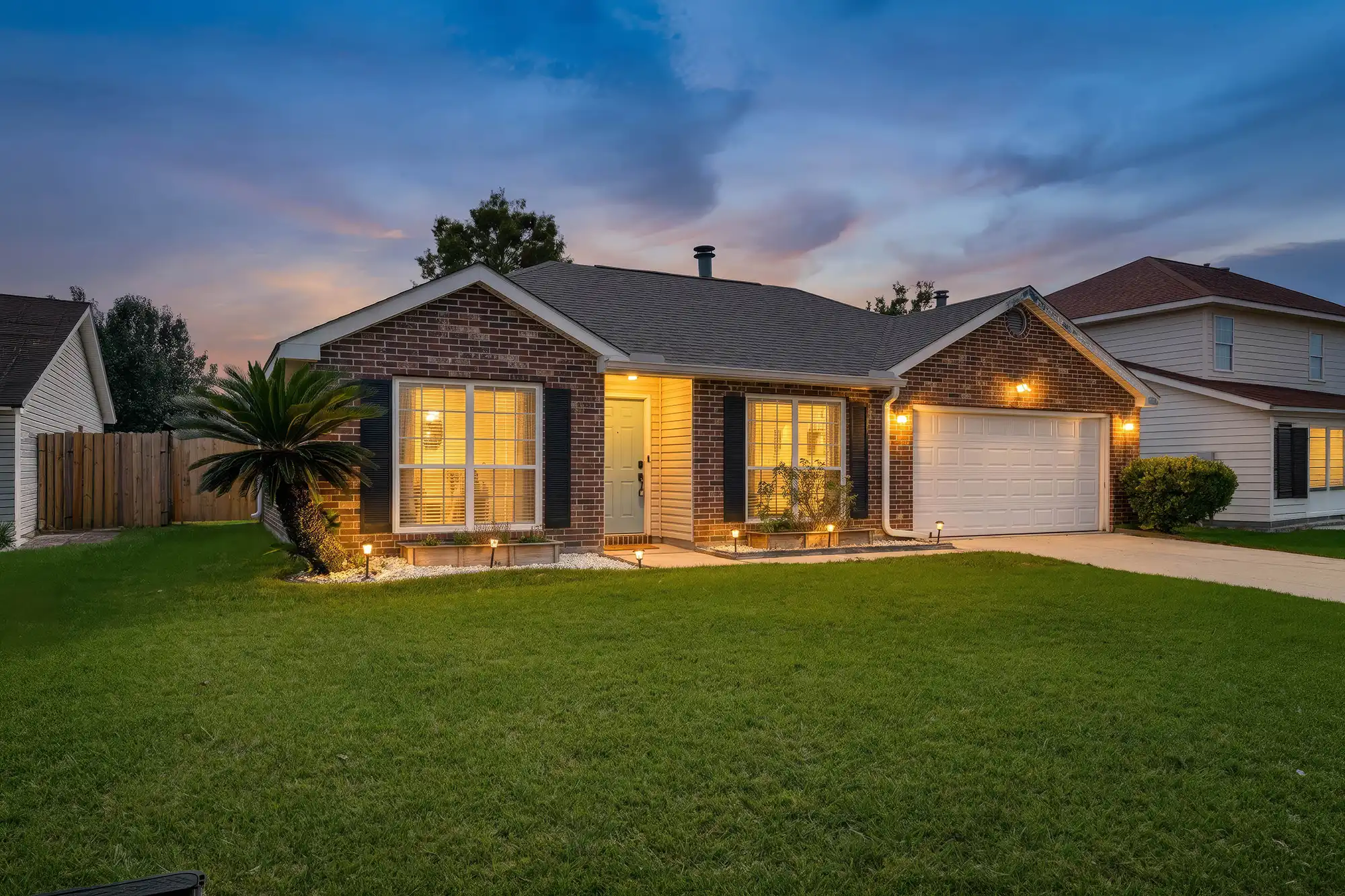 Beautiful residential home in Slidell, LA captured at sunset with golden hour lighting for real estate photography