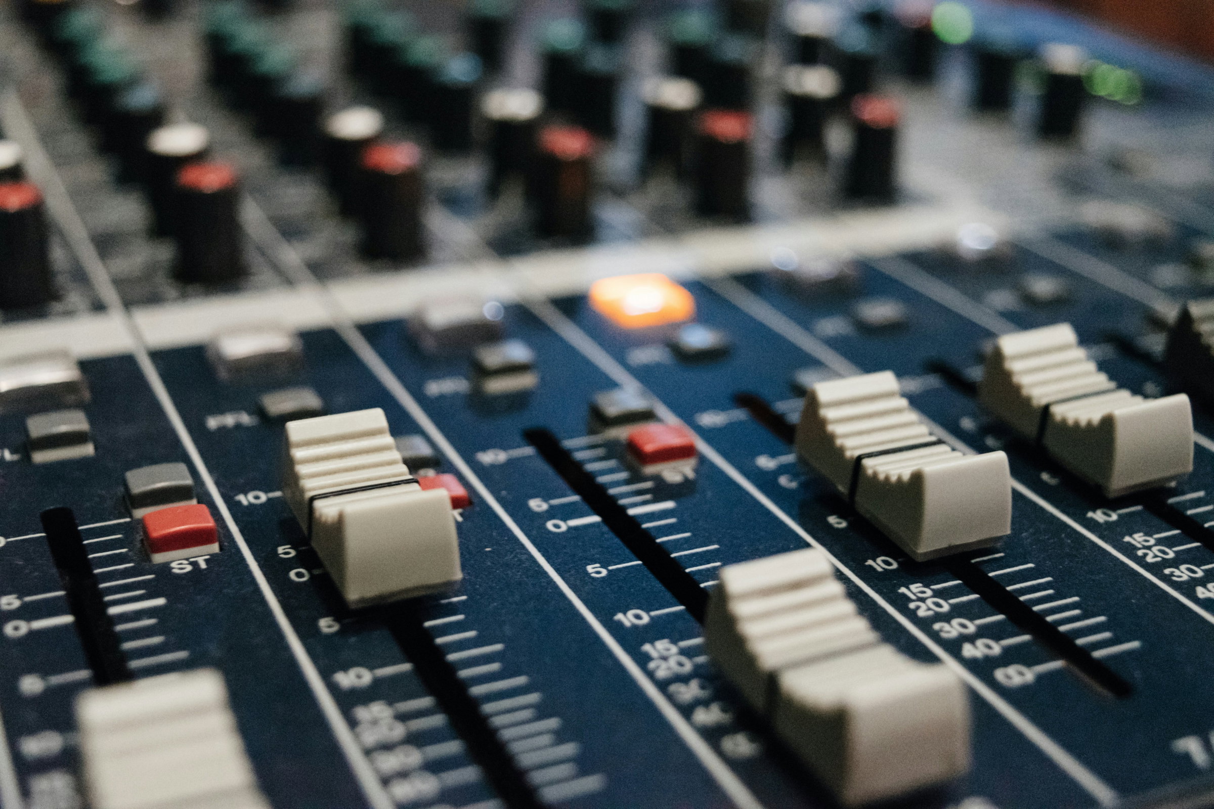 State-of-the-art recording studio with professional acoustic treatment and premium microphone setup